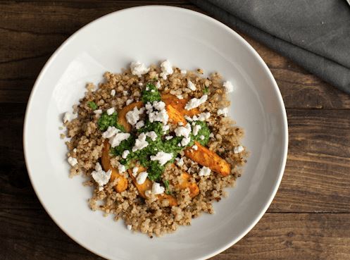 From Naturally Ella: Adobo Acorn Squash, Crispy Quinoa, and Jalapeño Chimichurri